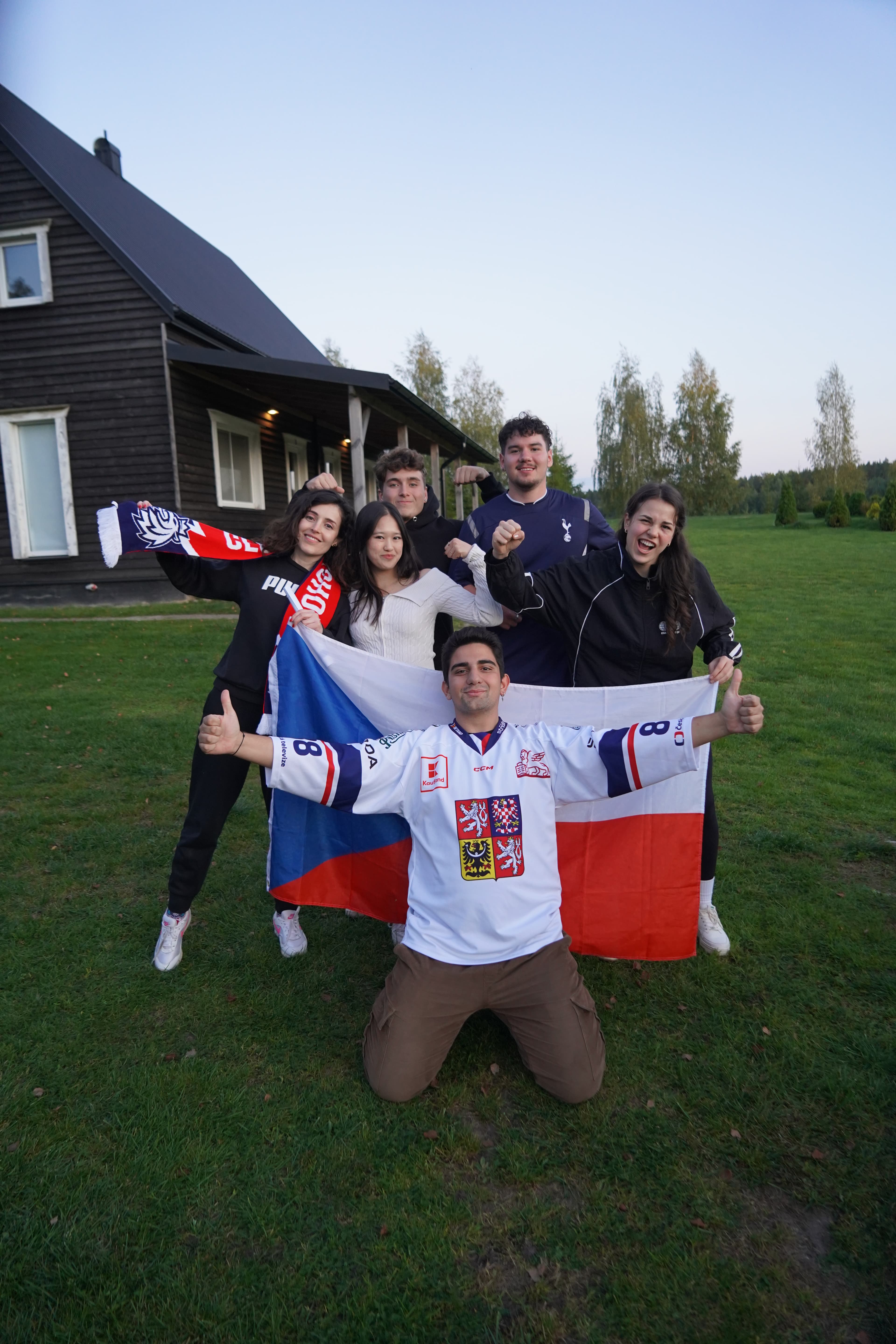 Erasmus students celebrating cultural connections with their flags